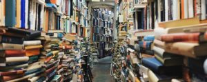 Collection of stacked books in a library